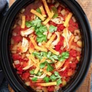 top view of tortilla soup in the slow cooker pot