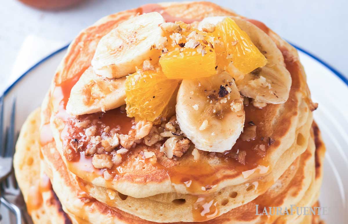 fruit topping on fluffy pancakes