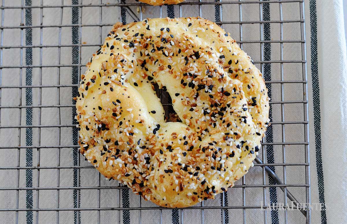 top view of a cloud bread bagel over a cooling rack