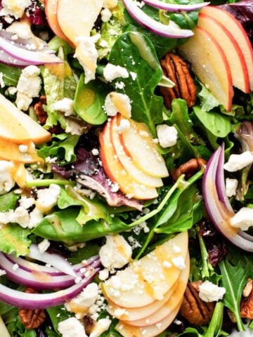 christmas salad with apples, pecans, greens and onion