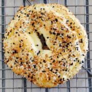 top view of cloud bread bagel over a cooling rack