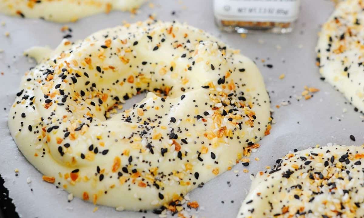 cloud bread bagel dough over a lined baking sheet