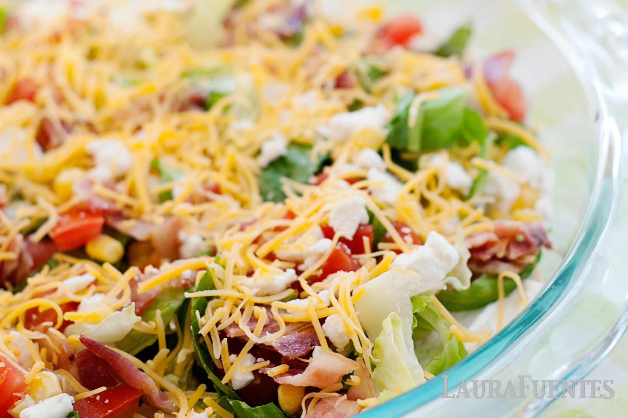 Cobb salad dip in a glass bowl