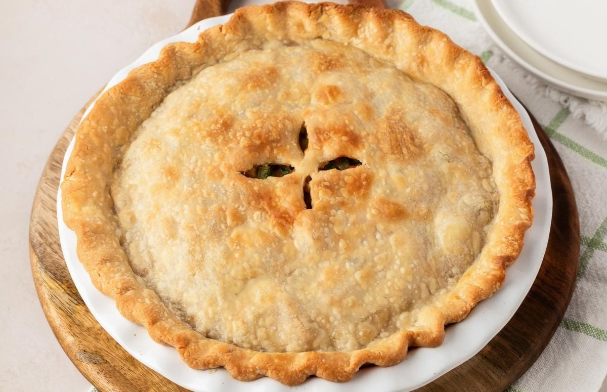 overhead image of a chicken pot pie with a golden crust