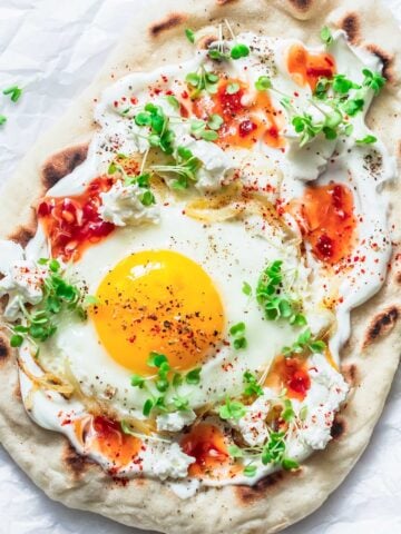 top view of breakfast naan with a fried egg