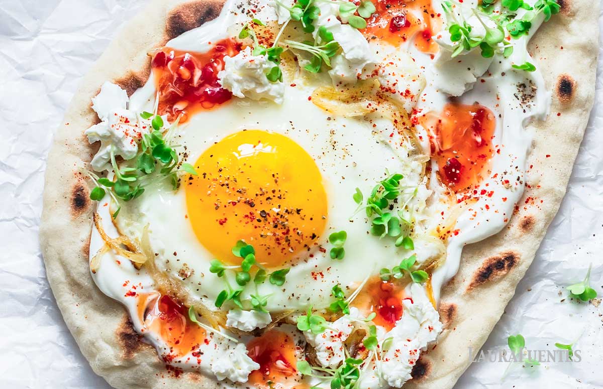 top view of breakfast naan with fried egg