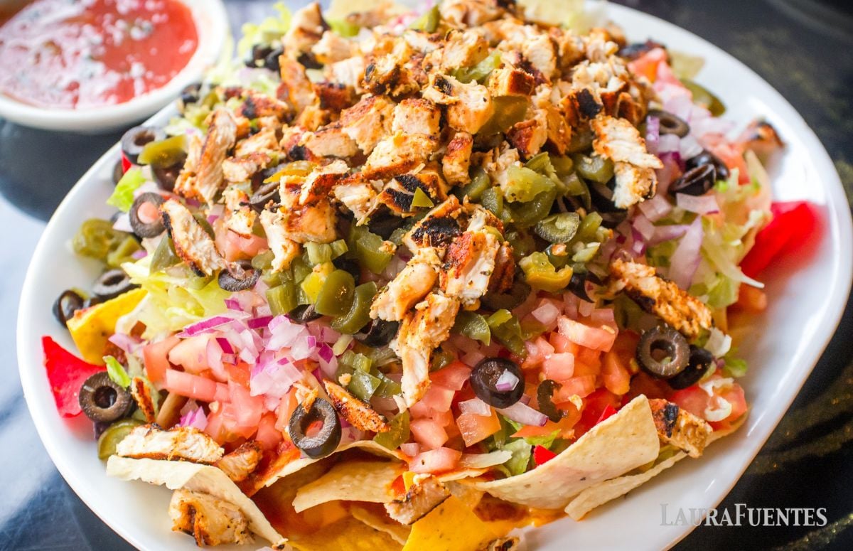 chicken fajita nachos on a tray