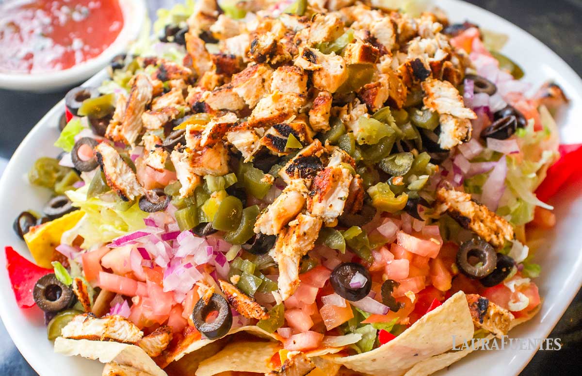 chicken fajita nachos on a tray
