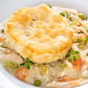 chicken pot pie with a biscuit on top