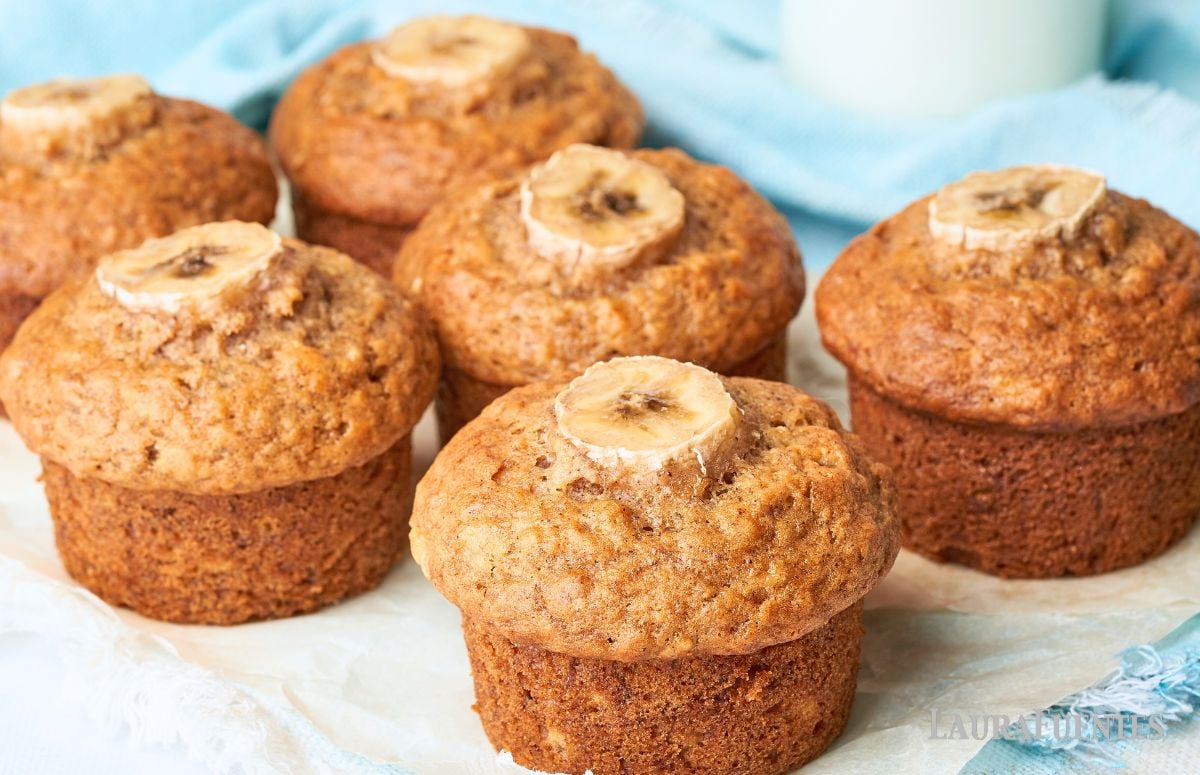 one banana muffin surrounded by other muffins