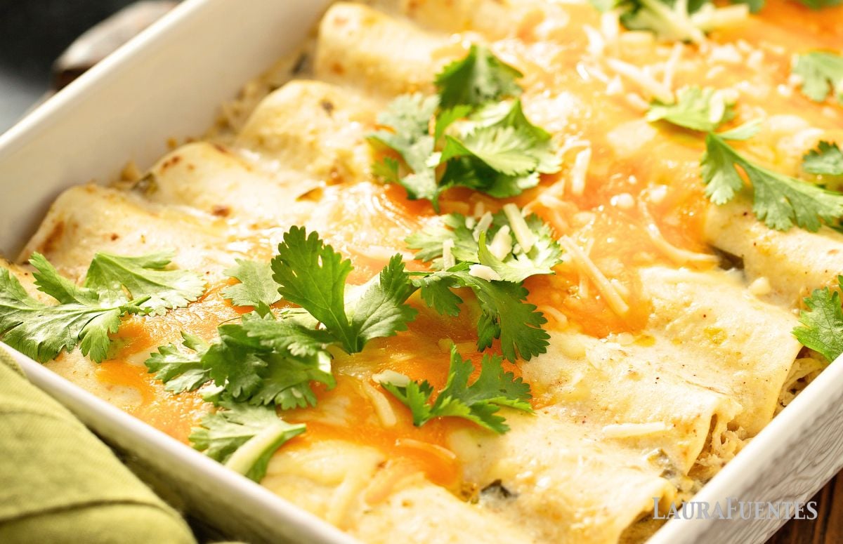 a baking dish with enchiladas