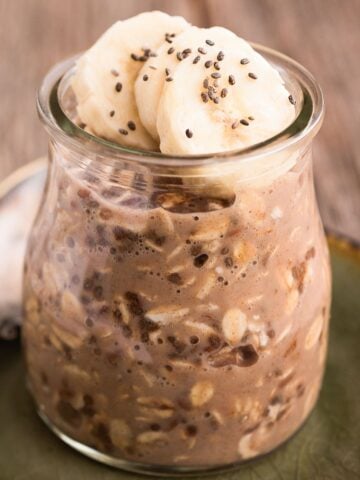 mocha overnight oats in a jar topped with banana slices
