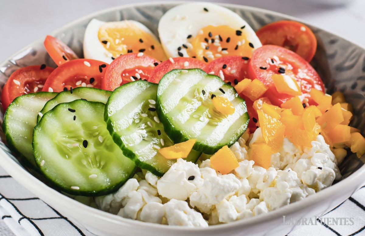 savory cottage cheese bowl with egg, cucumber, tomato, and bell pepper