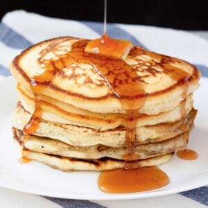 large stack of fluffy protein pancakes