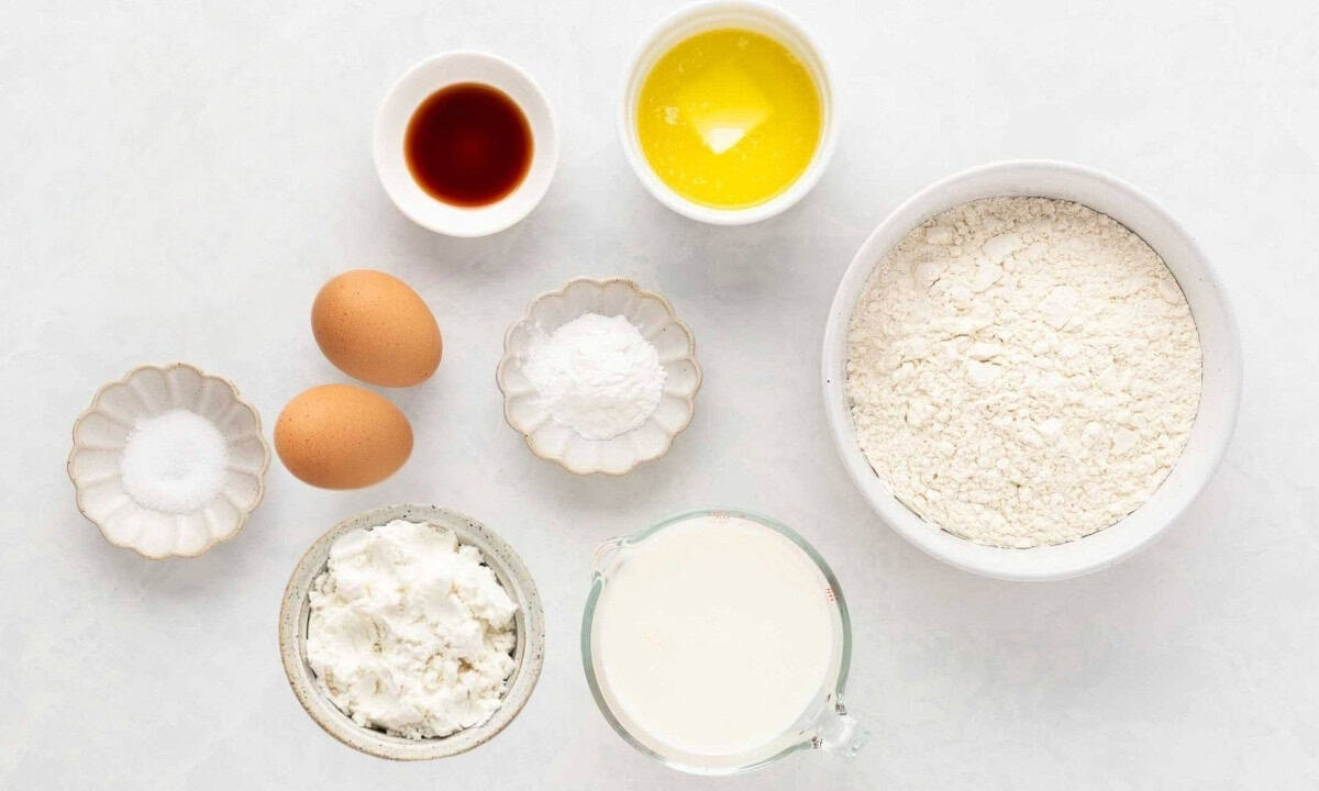 overhead view of ingredients needed to make protein pancakes with protein powder