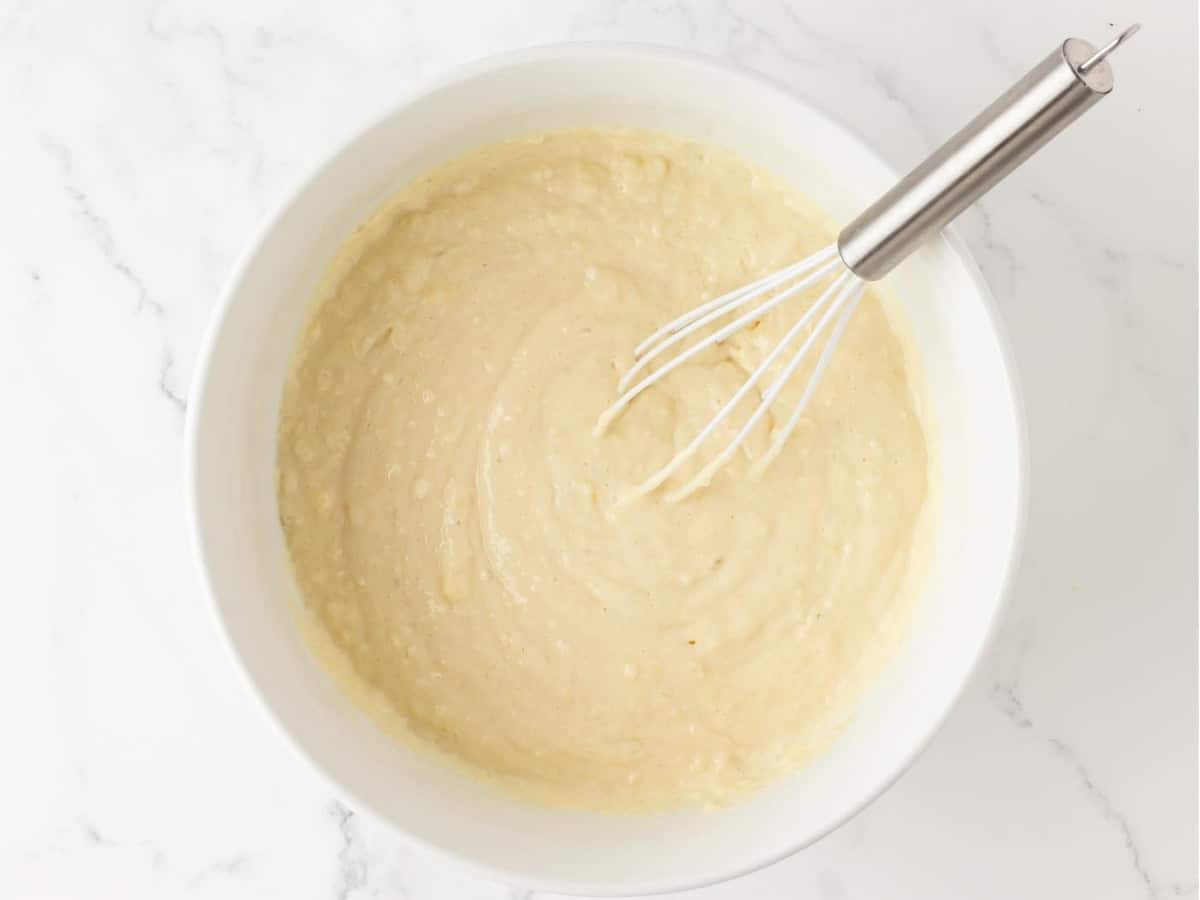 overhead view of pancake batter in a bowl to show texture