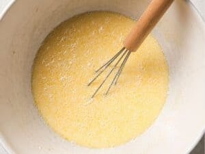 wet ingredients for pancake batter mixed in a bowl