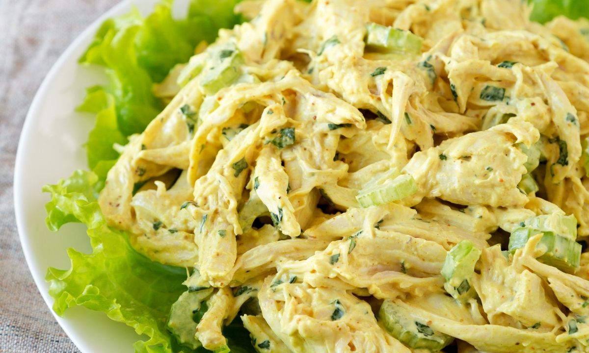 Curried chicken salad over a bed of greens