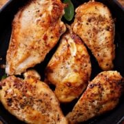 top view of five baked chicken breasts