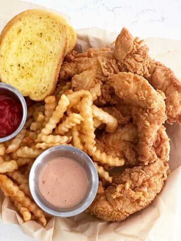 copycat canes nuggets and fries with texas toast and two sauces