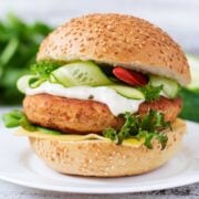 a chicken burgers on a white dish