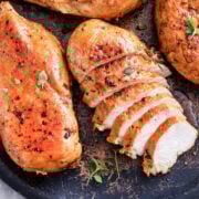 tow view of two sliced chipotle chicken breasts, one of them sliced