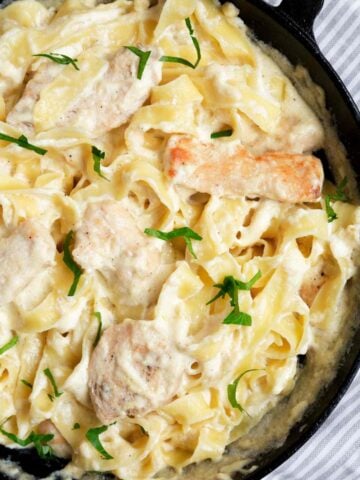 top view of cottage cheese chicken alfredo in a skillet