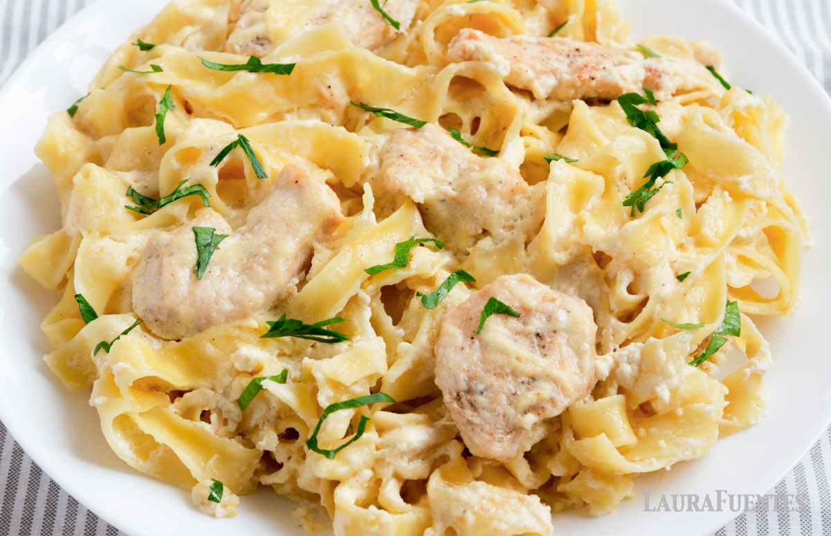 cottage cheese chicken alfredo in a white plate