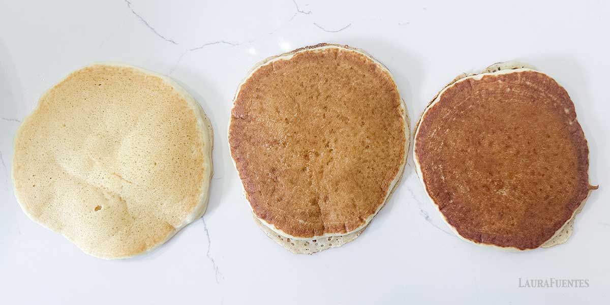 Left to right: pancakes on low heat, medium-low heat, pan too hot.