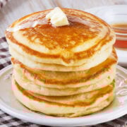 stack of three pancakes on a single plate