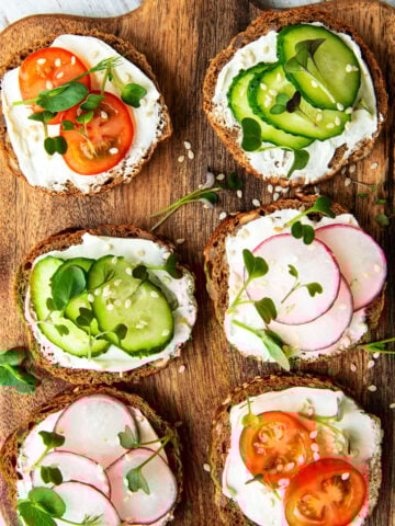 top view of six toast with cottage cheese and different toppings