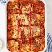 overhead view of a rectangular baking dish with oven baked cottage cheese lasagna