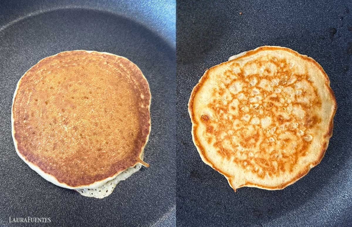 two buttermilk pancakes cooking side by side