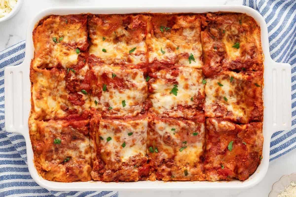 overhead view of a rectangular baking dish with oven baked cottage cheese lasagna