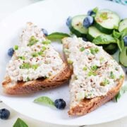 two pieces of toast with cottage cheese chicken salad