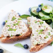two pieces of toast with cottage cheese chicken salad