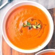 top view of a bowl of creamy tomato soup