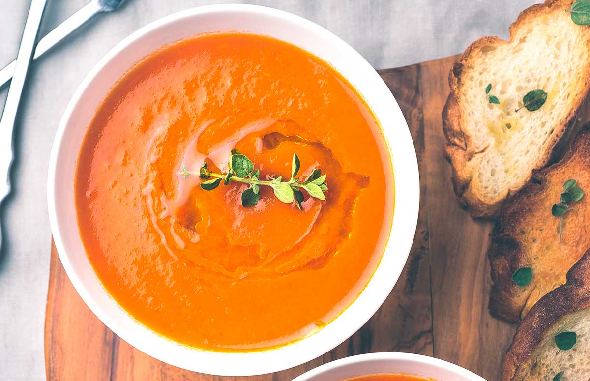 top view of a bowl of cottage cheese tomato soup