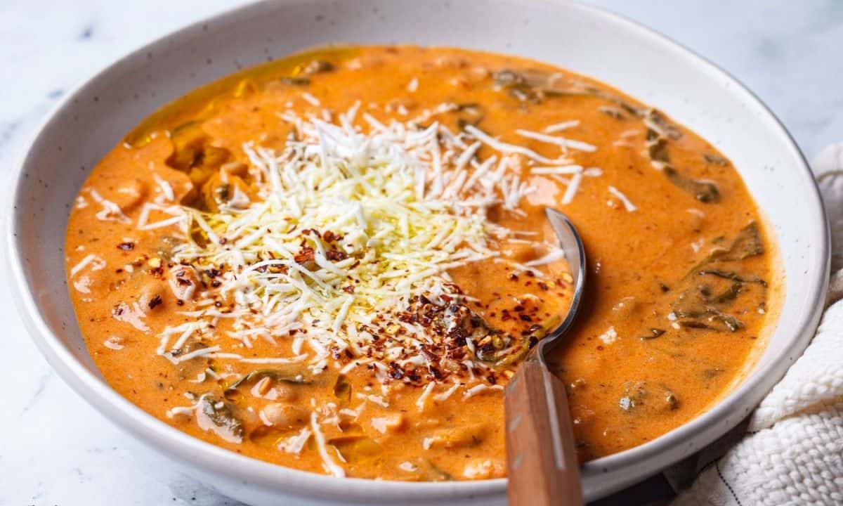 a bowl of of cottage cheese tomato soup with beans