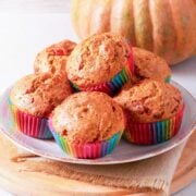 a tray with six pumpkin cottage cheese muffins