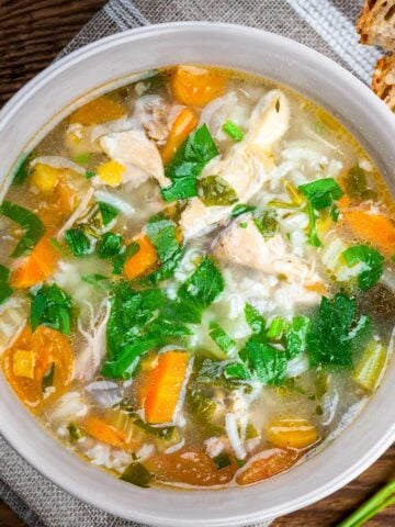 top view of a bowl of lemon chicken and rice soup