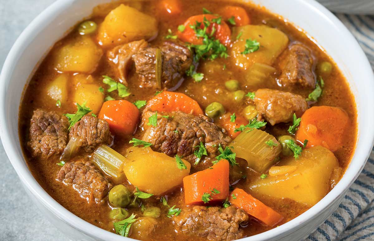 bowl of carrot potato and beef stew