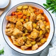 overhead view of a bowl of zucchini chicken stew