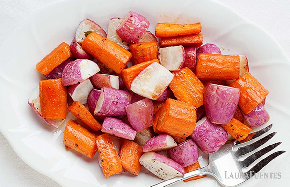 a bowl with radishes and carrots