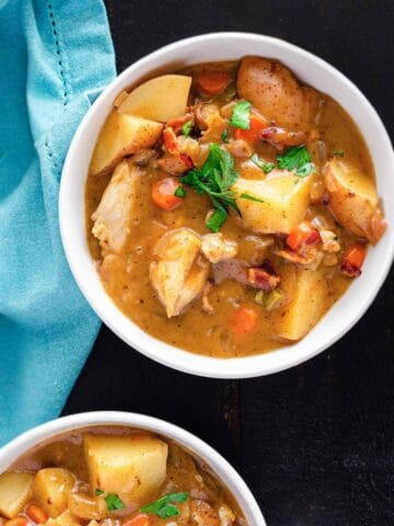 top view of two bowls with chicken stew