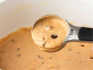 close up of the batter texture of pumpkin chocolate chip batter