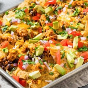 close up of sheet pan chicken nachos