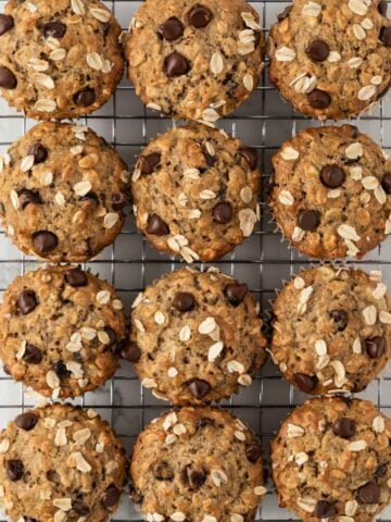 Overhead view of chocolate chip oatmeal muffins on a cooling rack