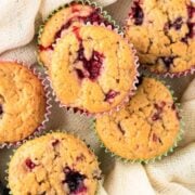 top view of six mixed berry muffins