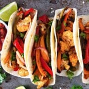 four cauliflower tacos with fajita veggies